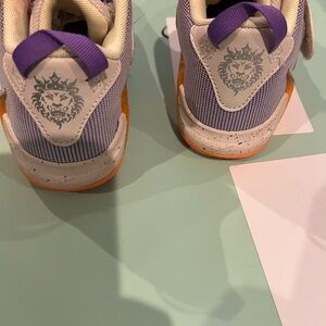 Nike Purple and Pink Sneakers with Slip-On Design